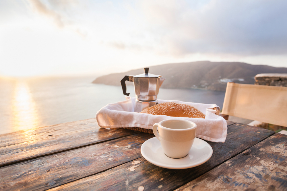 Mediterranean,Breakfast,,Cup,Of,Coffee,And,Fresh,Bread,On,A